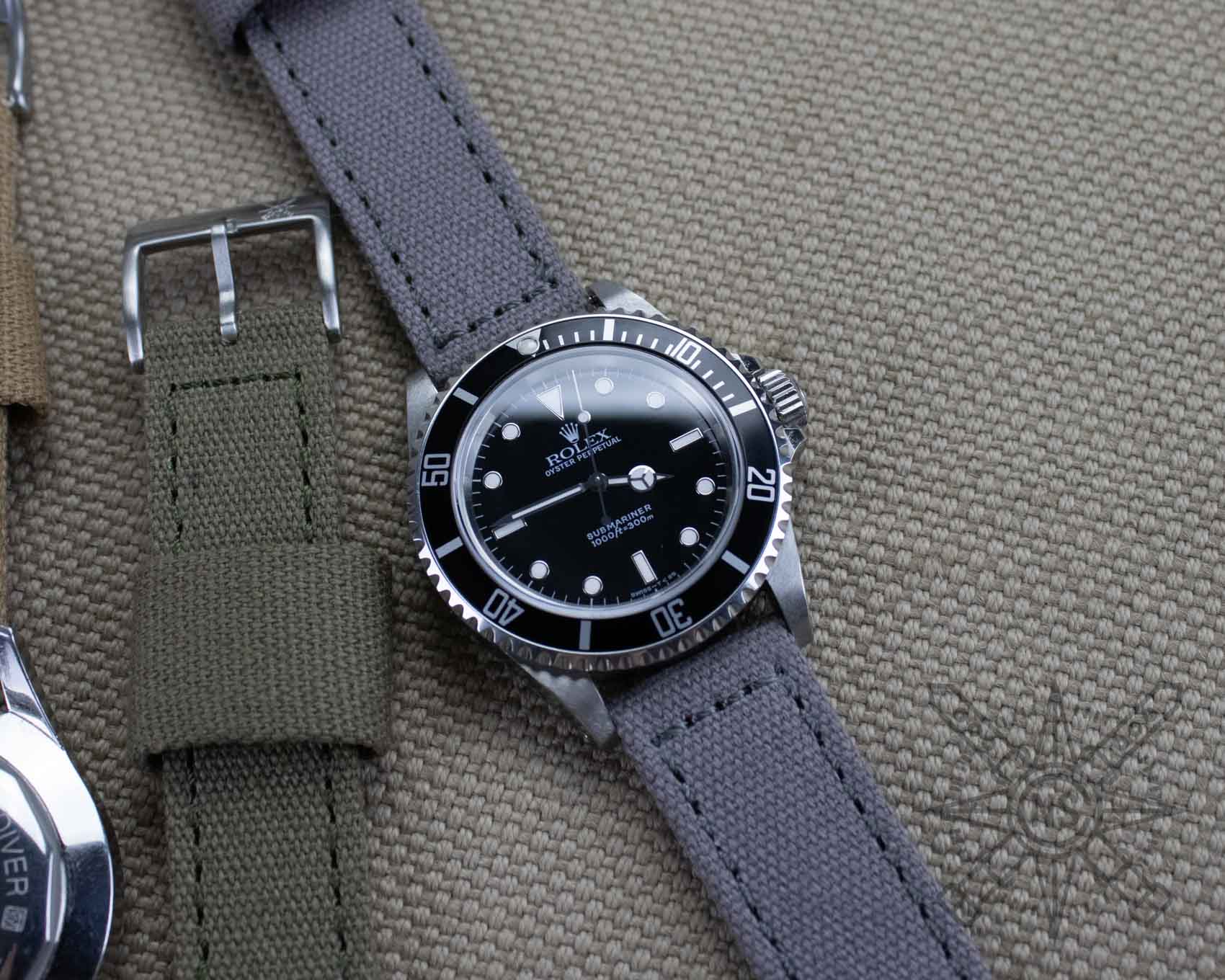 Gray canvas watch strap on a Rolex Submariner