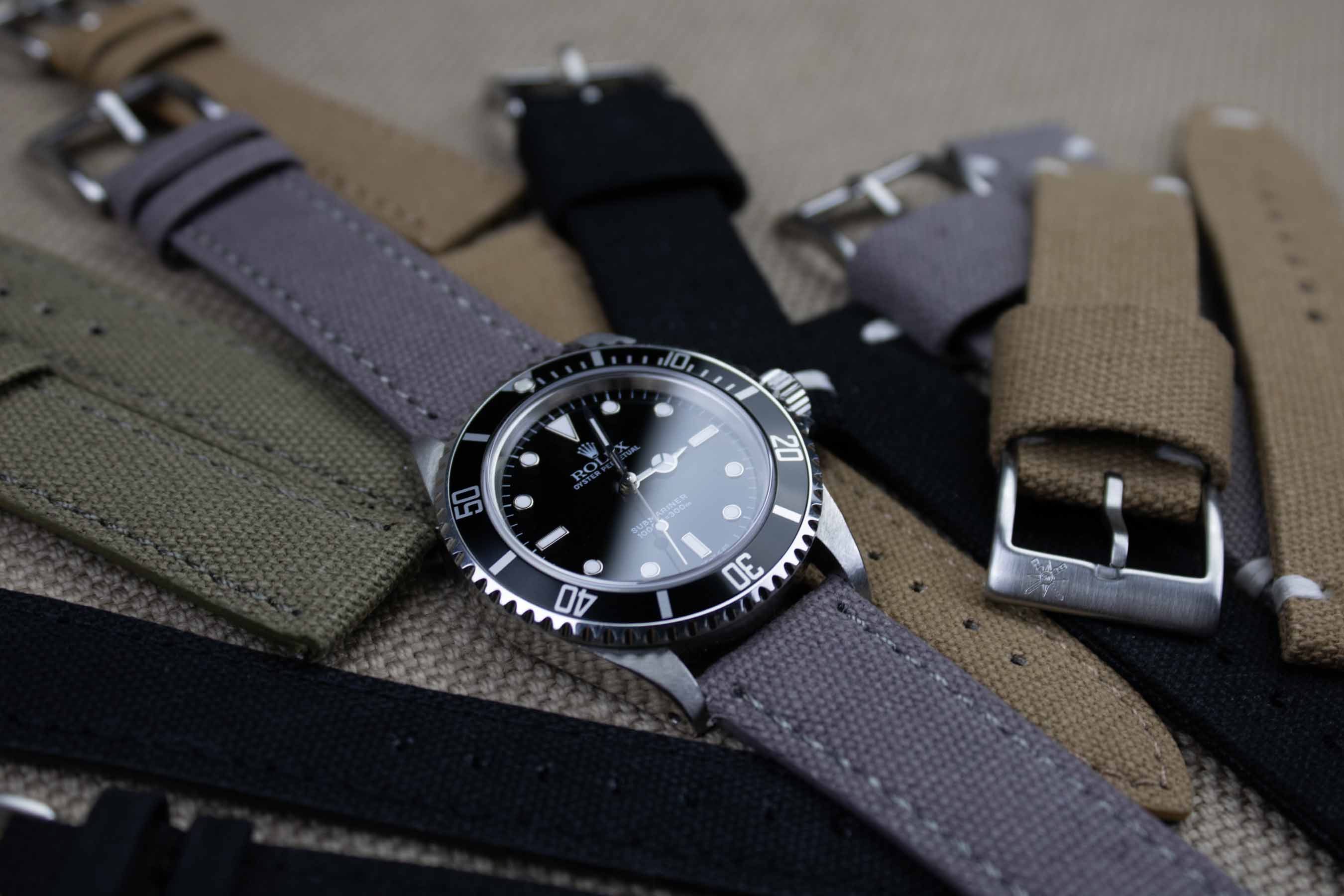 Gray canvas watch band on a Rolex Submariner