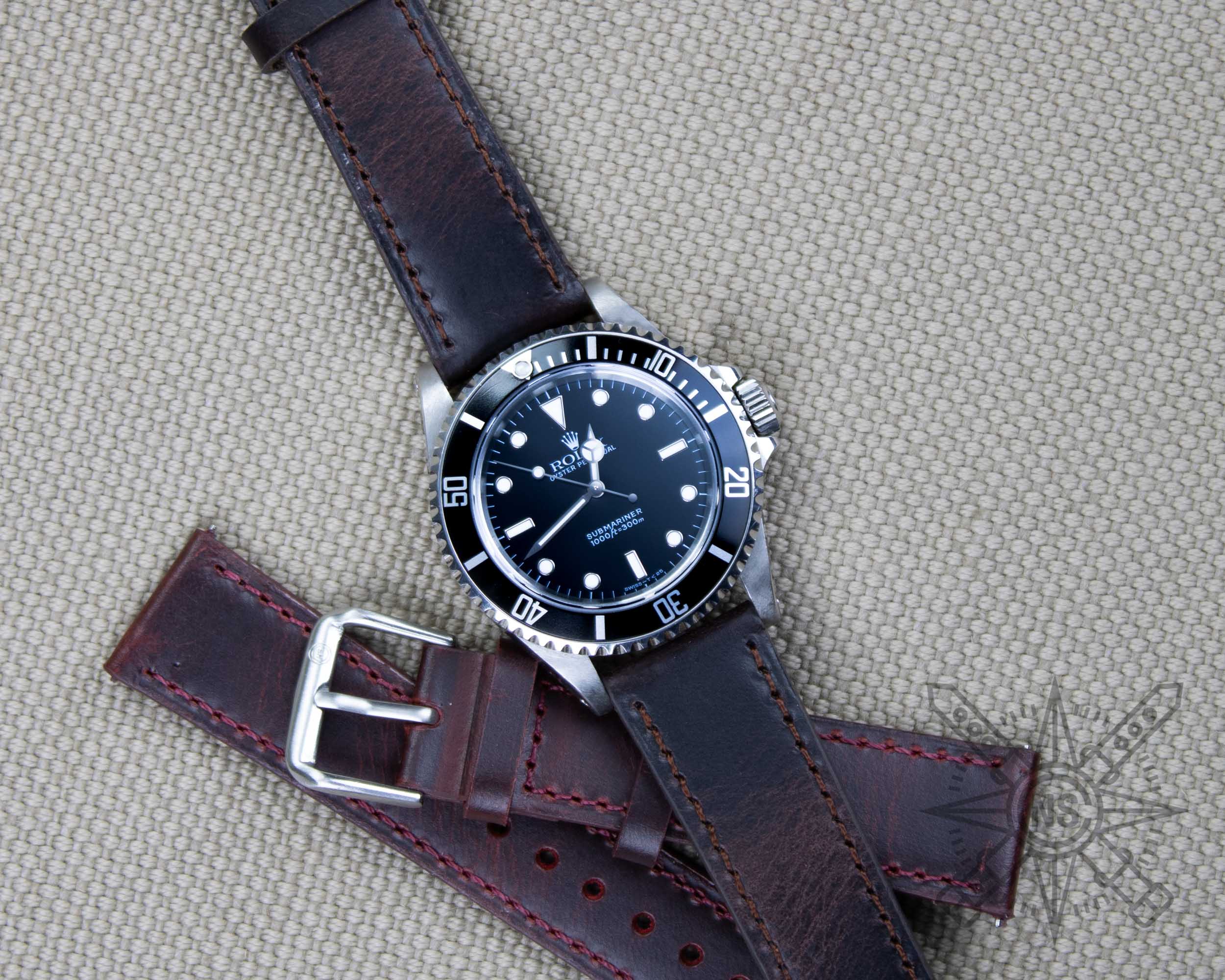 Rolex Submariner on a brown leather watch band