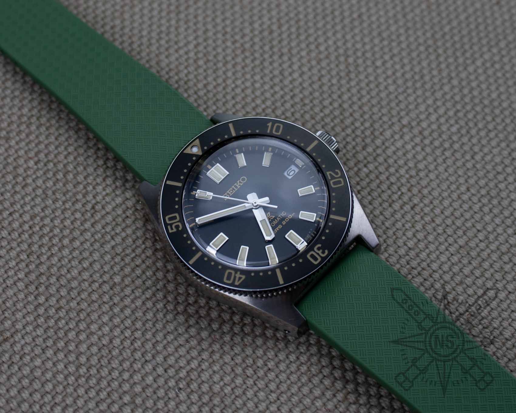 Green rubber watch strap on a Seiko