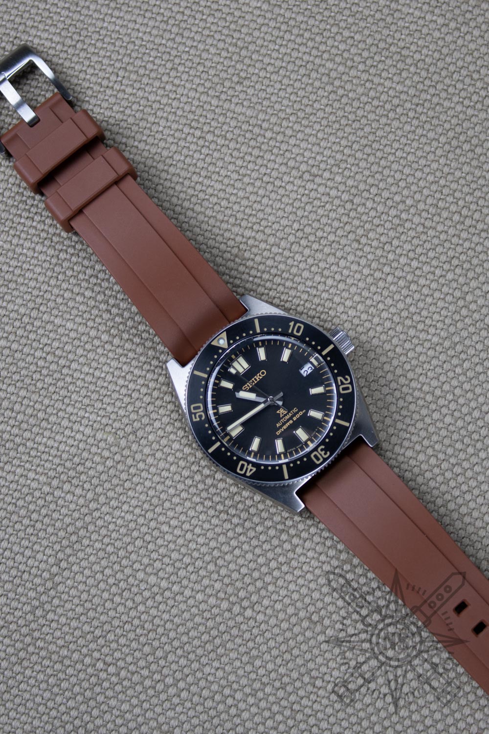 Seiko SPB on a brown rubber watch band