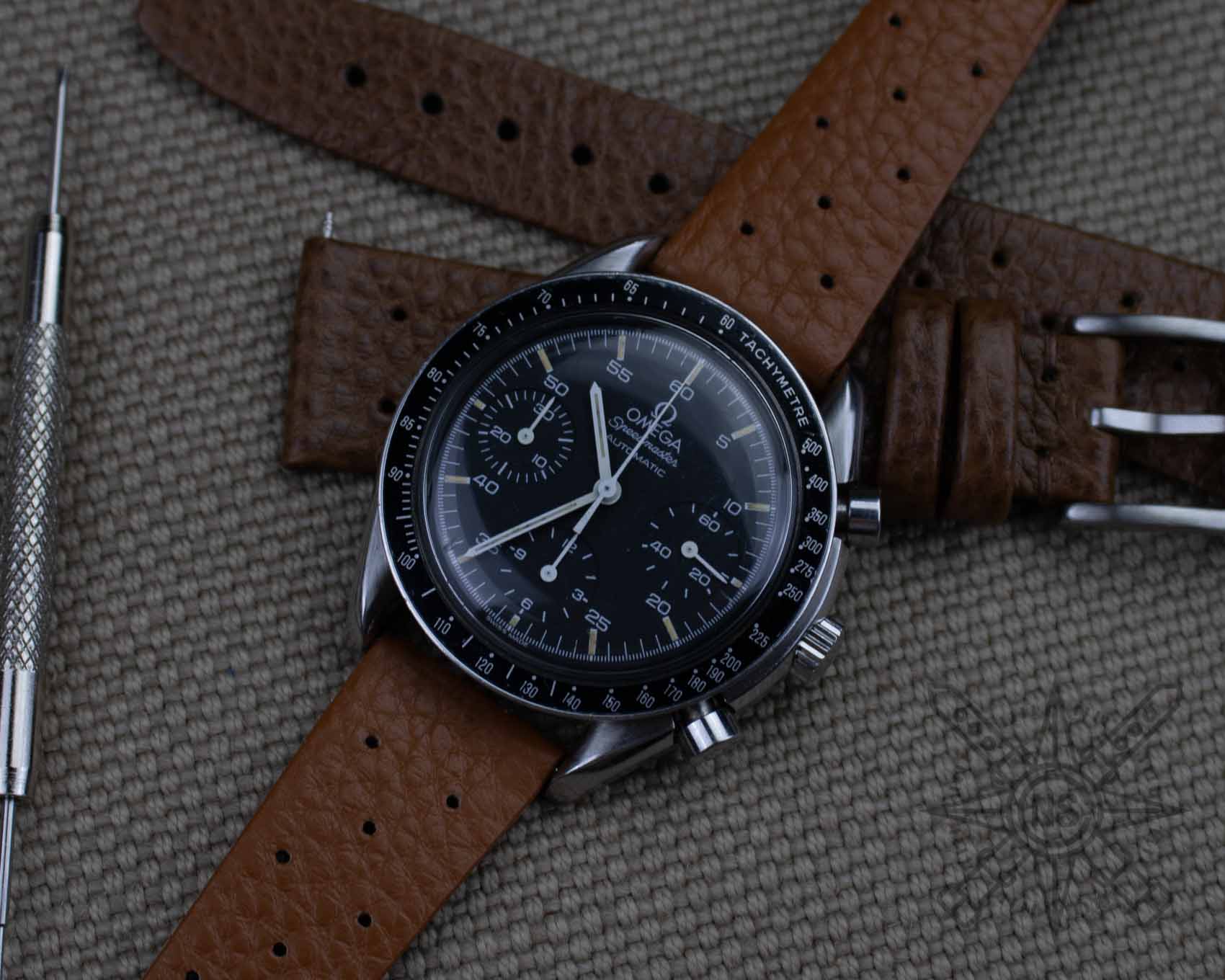 Brown racing watch band on a Omega Speedmaster