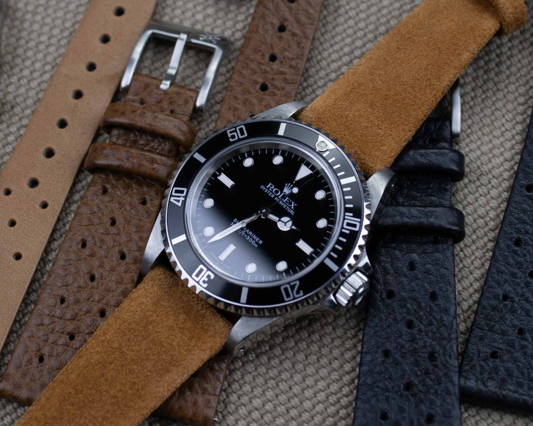 Brown suede watch band on a Rolex Submariner