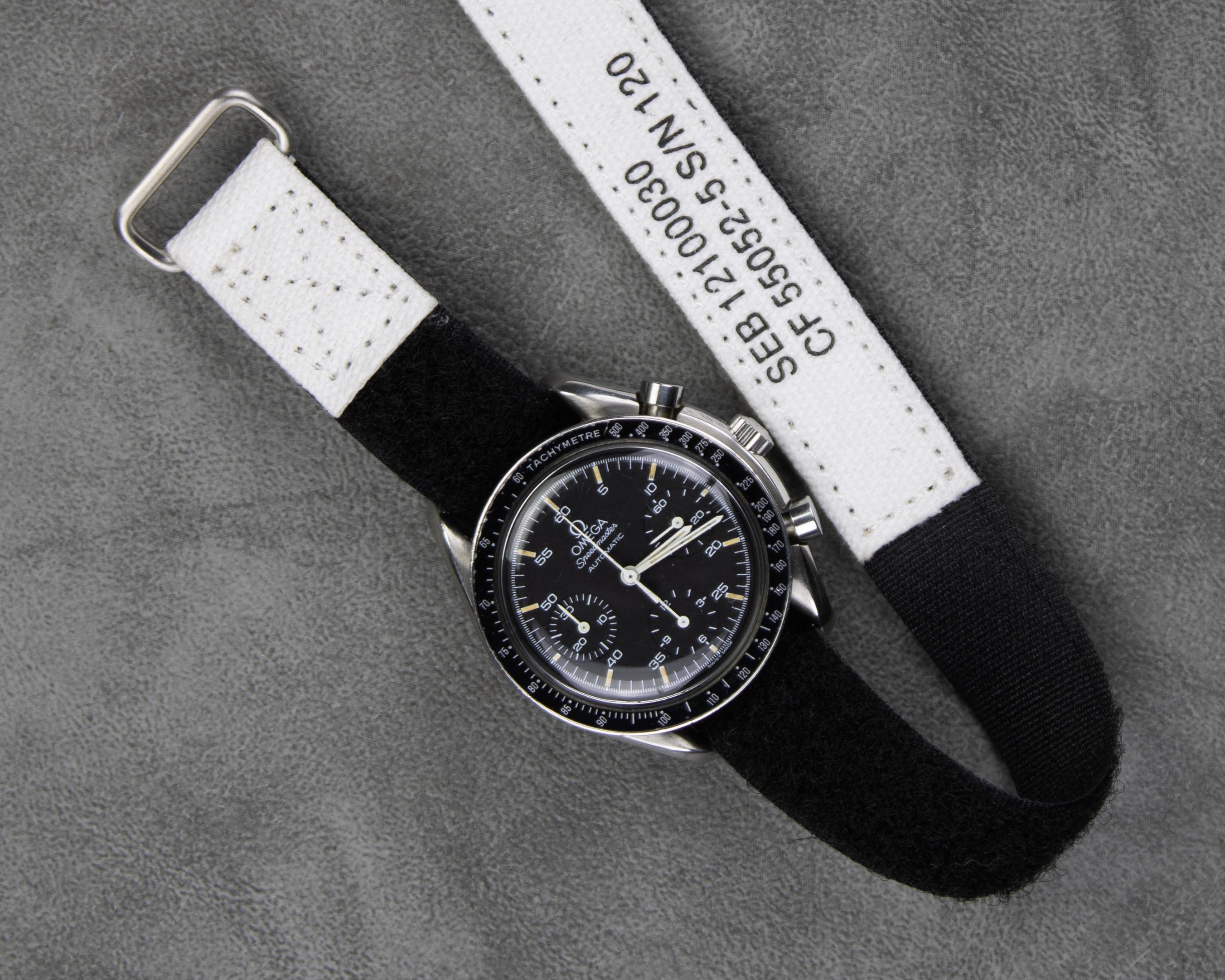 White NASA velcro watch strap on a Omega Speedmaster