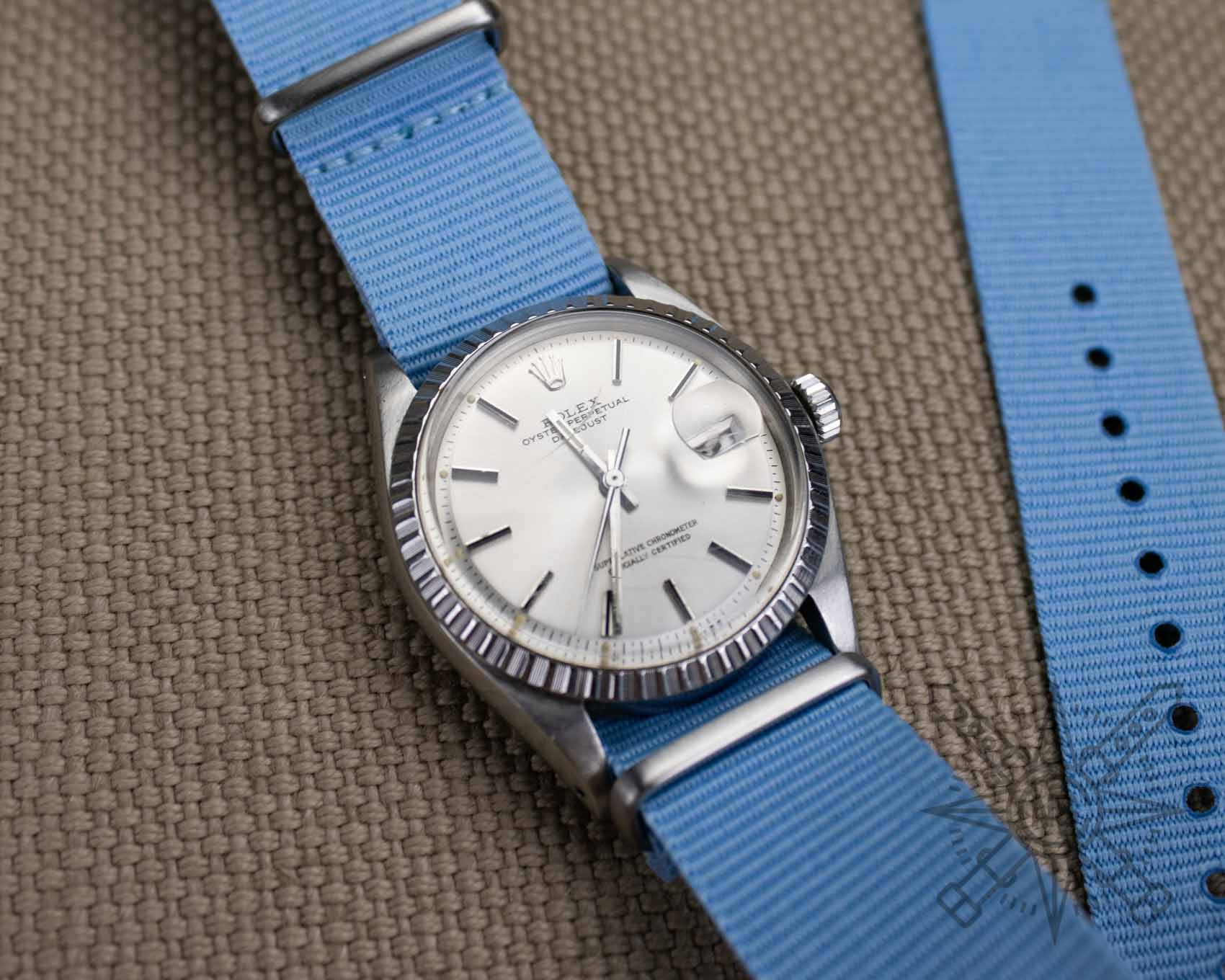 Rolex Datejust on a blue watch strap