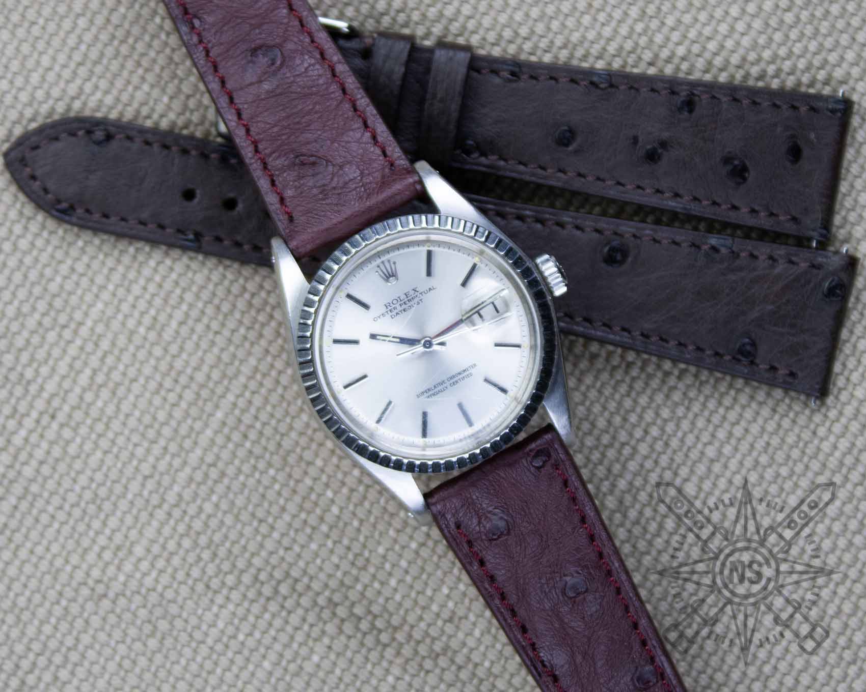 Rolex Datejust with a burgundy red ostrich leather watch strap