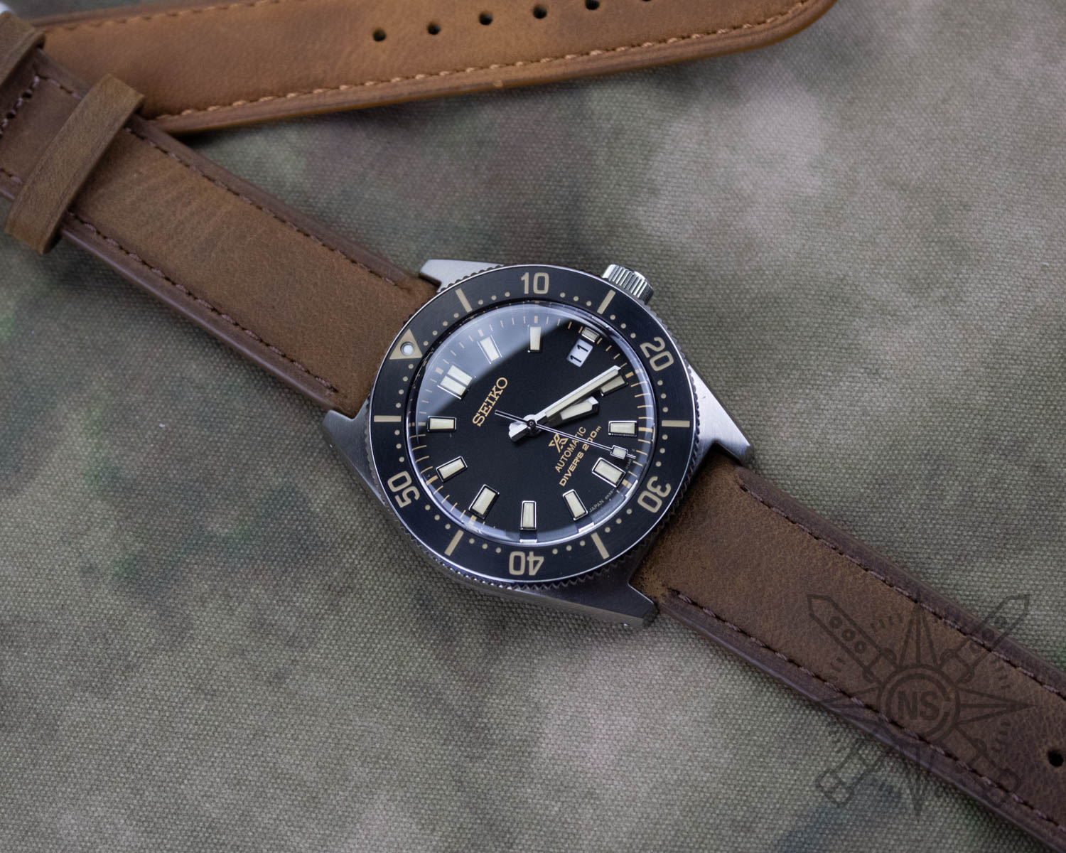 Oiled brown leather watch band on a Seiko dive watch