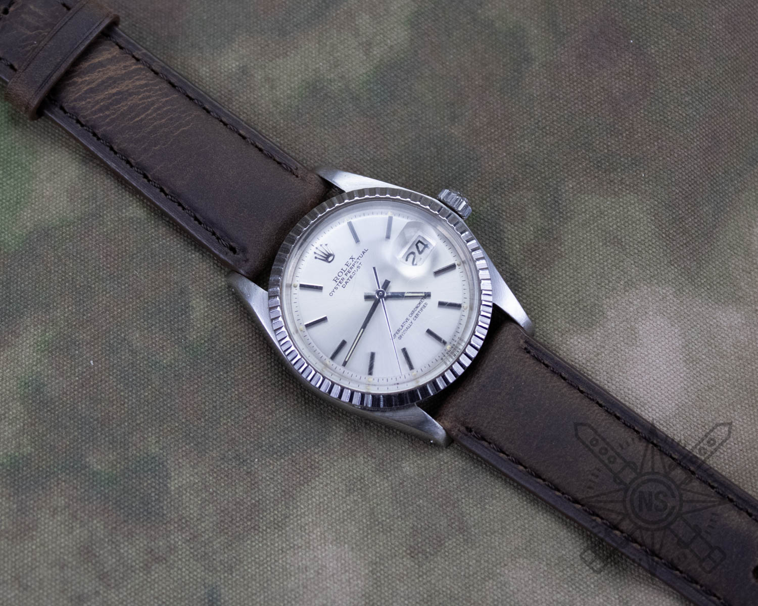 Rolex Datejust on a brown leather watch band