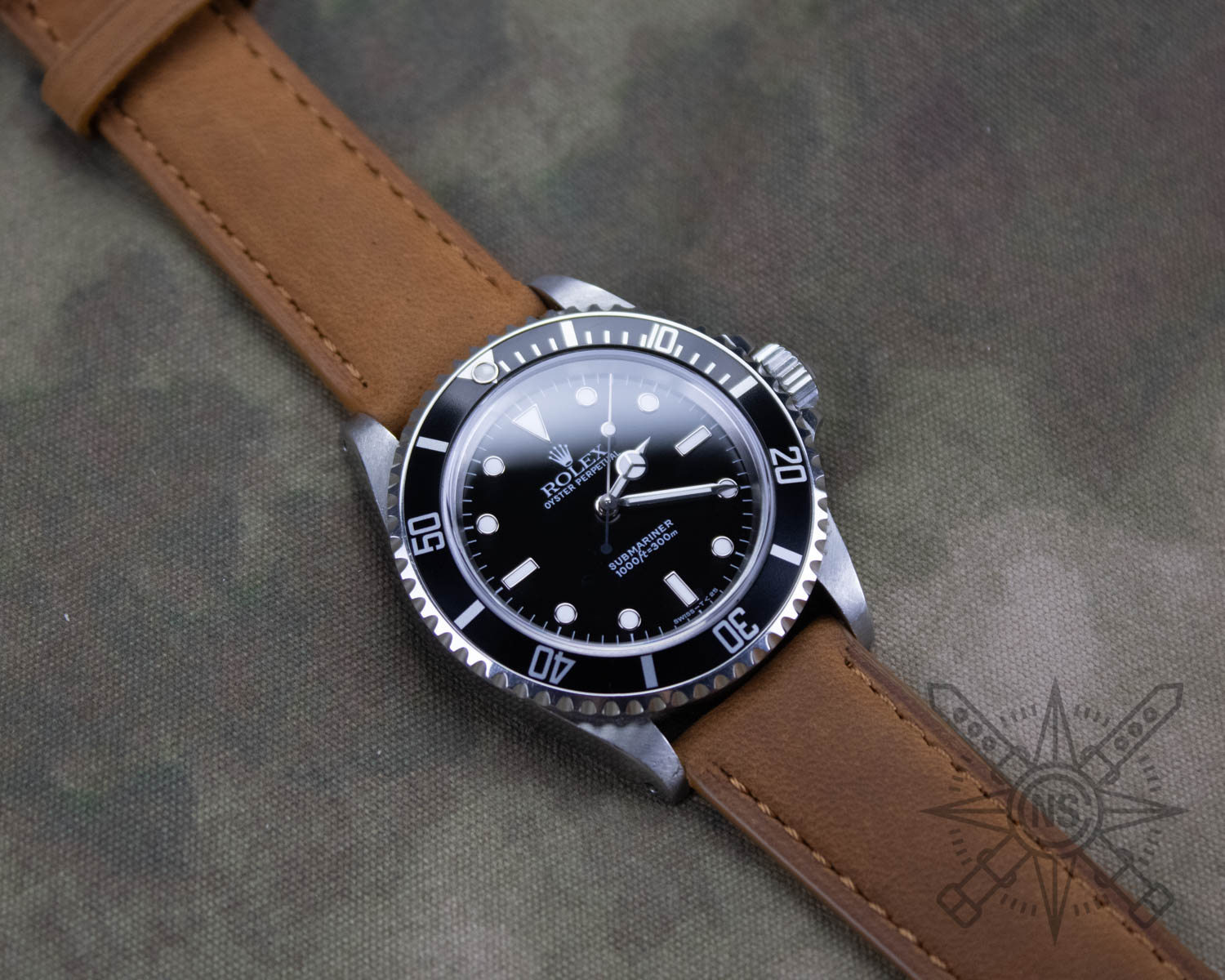 Brown leather watch band on a Rolex Submariner