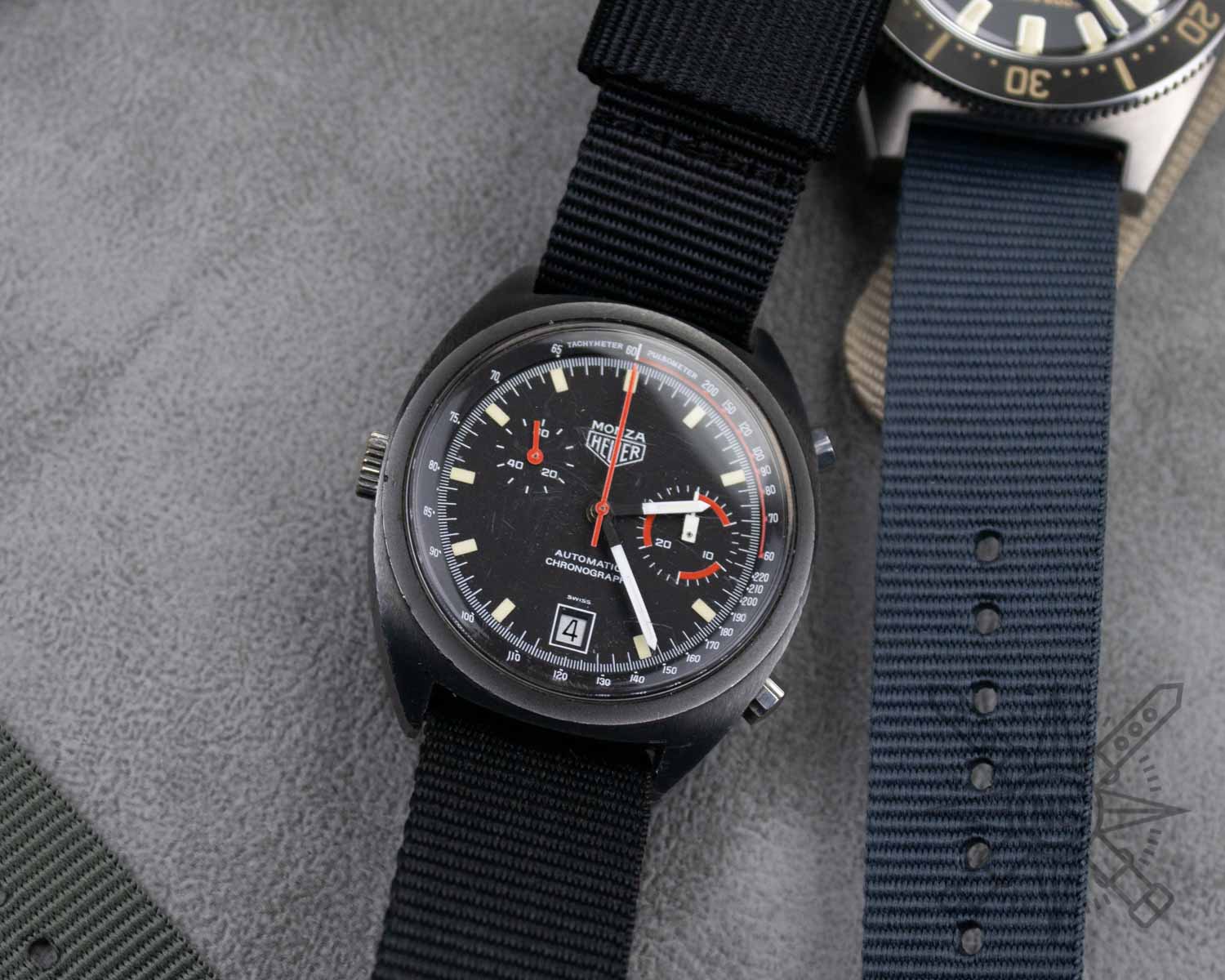 Vintage Heuer Monza on a black Nylon watch strap