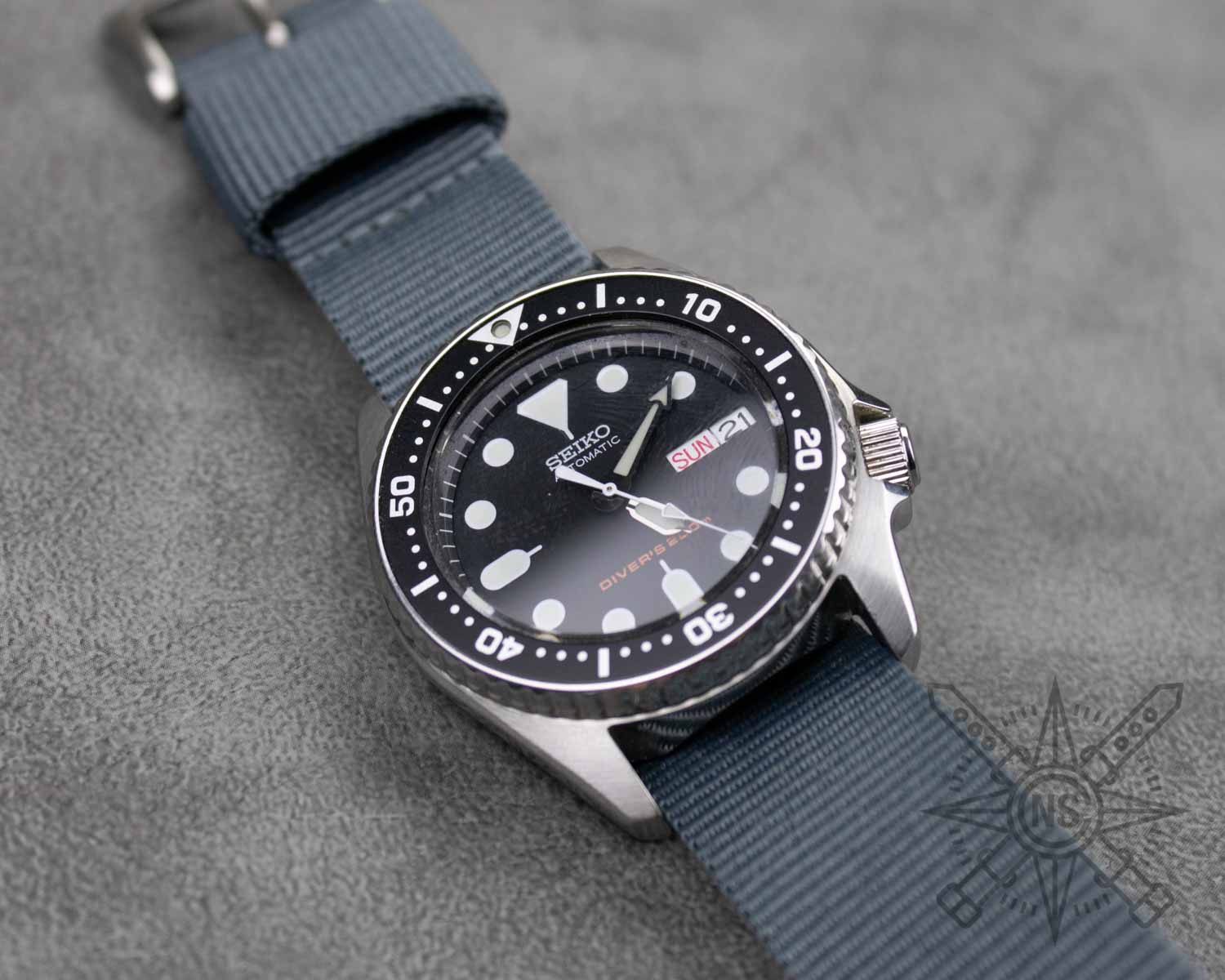 Gray military watch strap on a Seiko diver