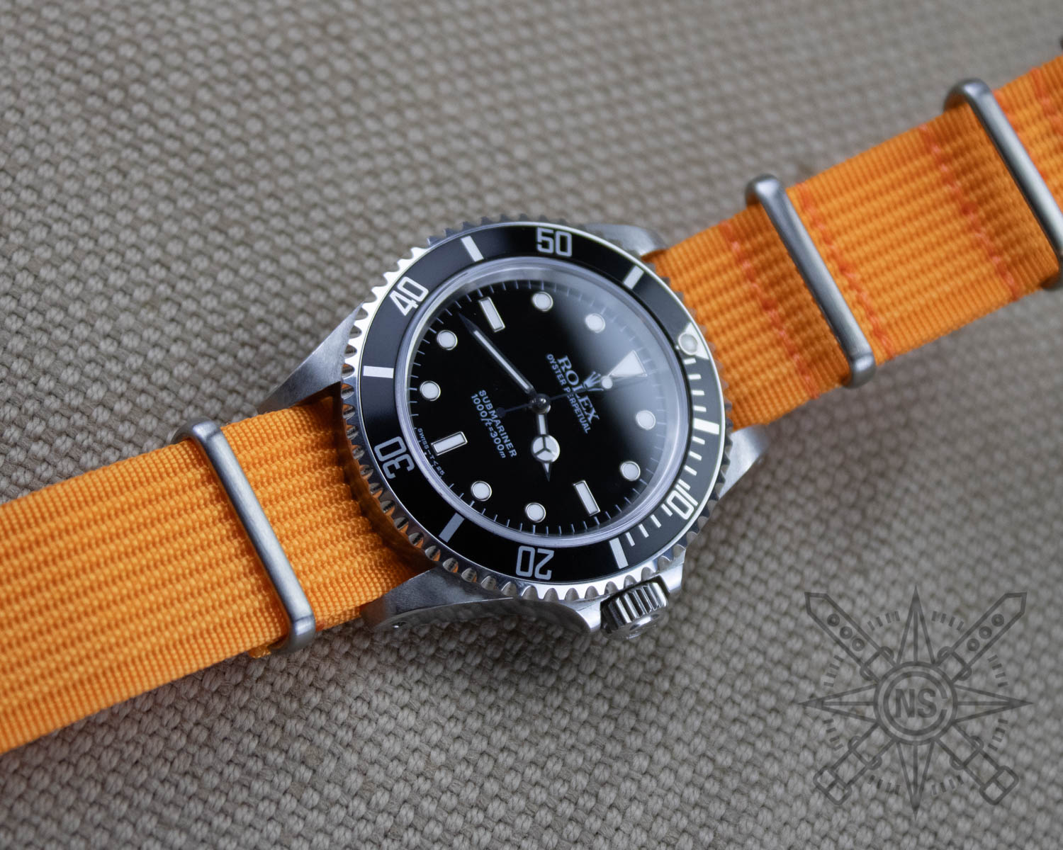 Orange nylon watch strap on a Rolex Submariner Orange nylon watch strap on a Rolex Submariner