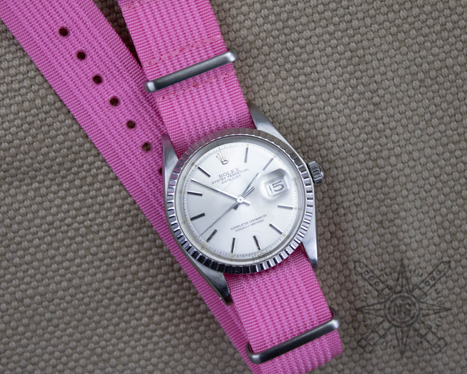 Pink watch strap on a Rolex Datejust