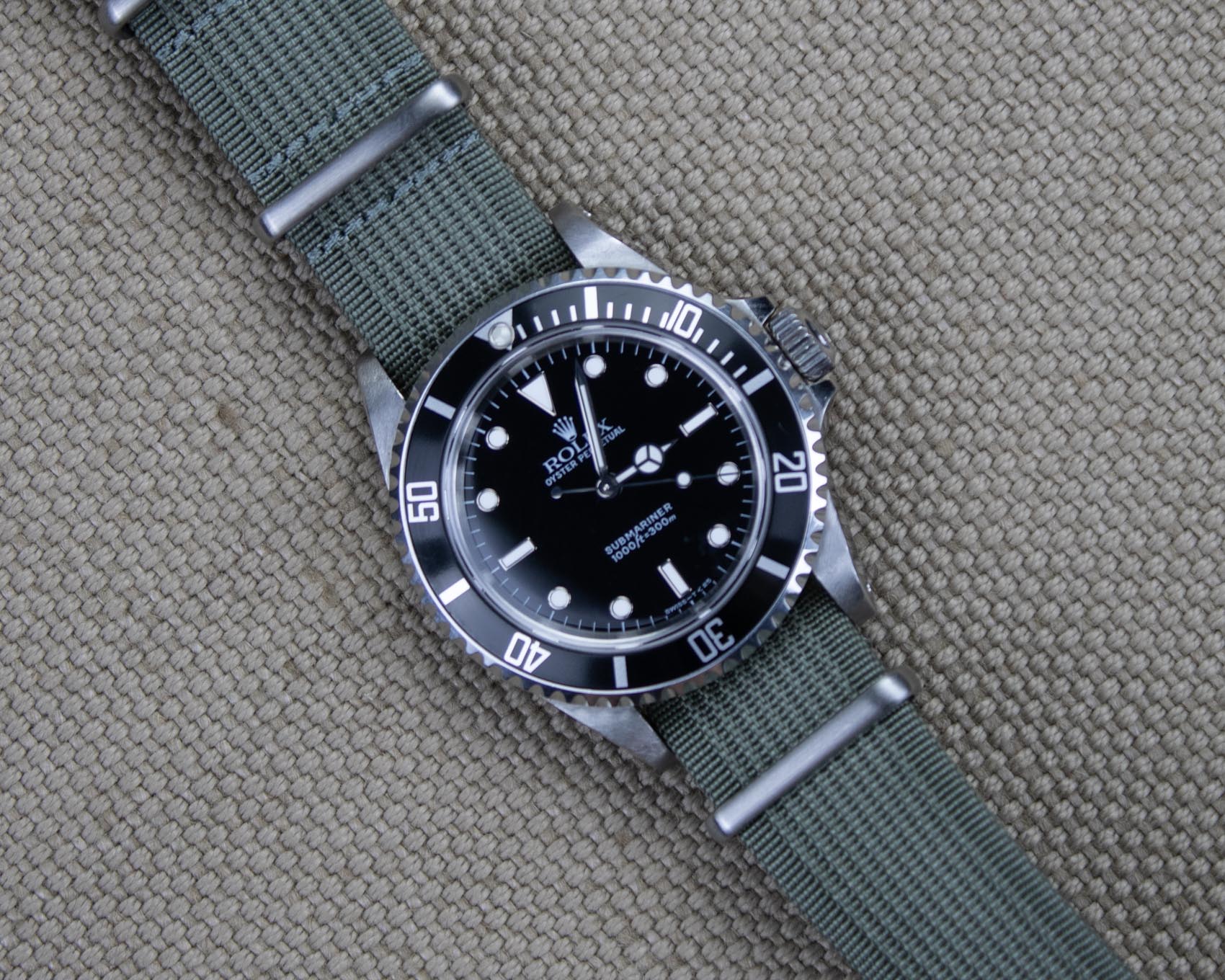 Gray nylon watch band on a Rolex Submariner