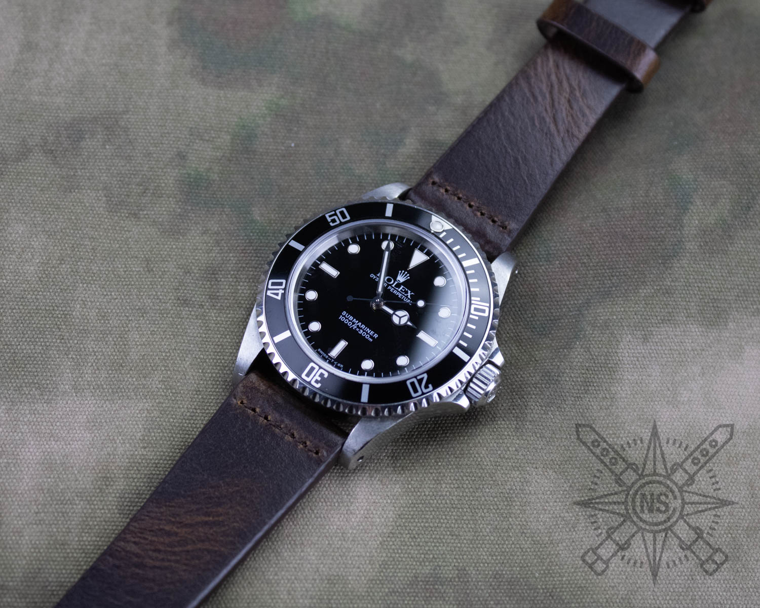 Brown leather watch band on a Rolex Submariner