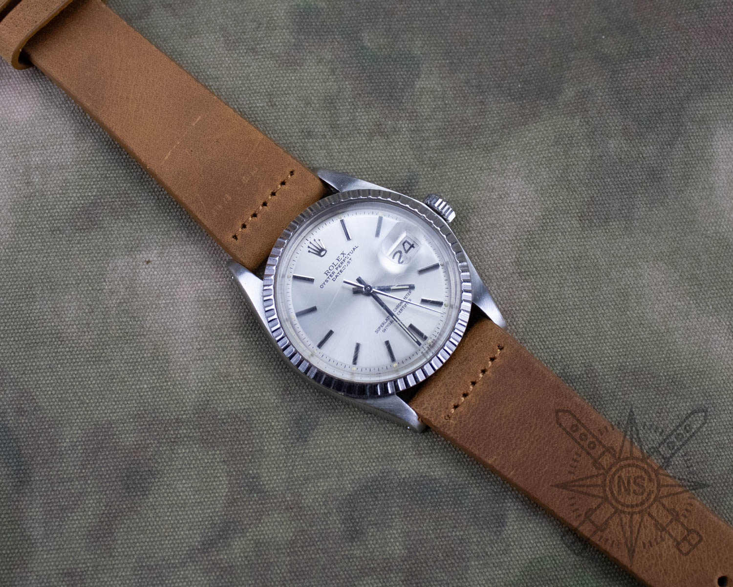 Row-stitches brown leather watch band on a Rolex Datejust