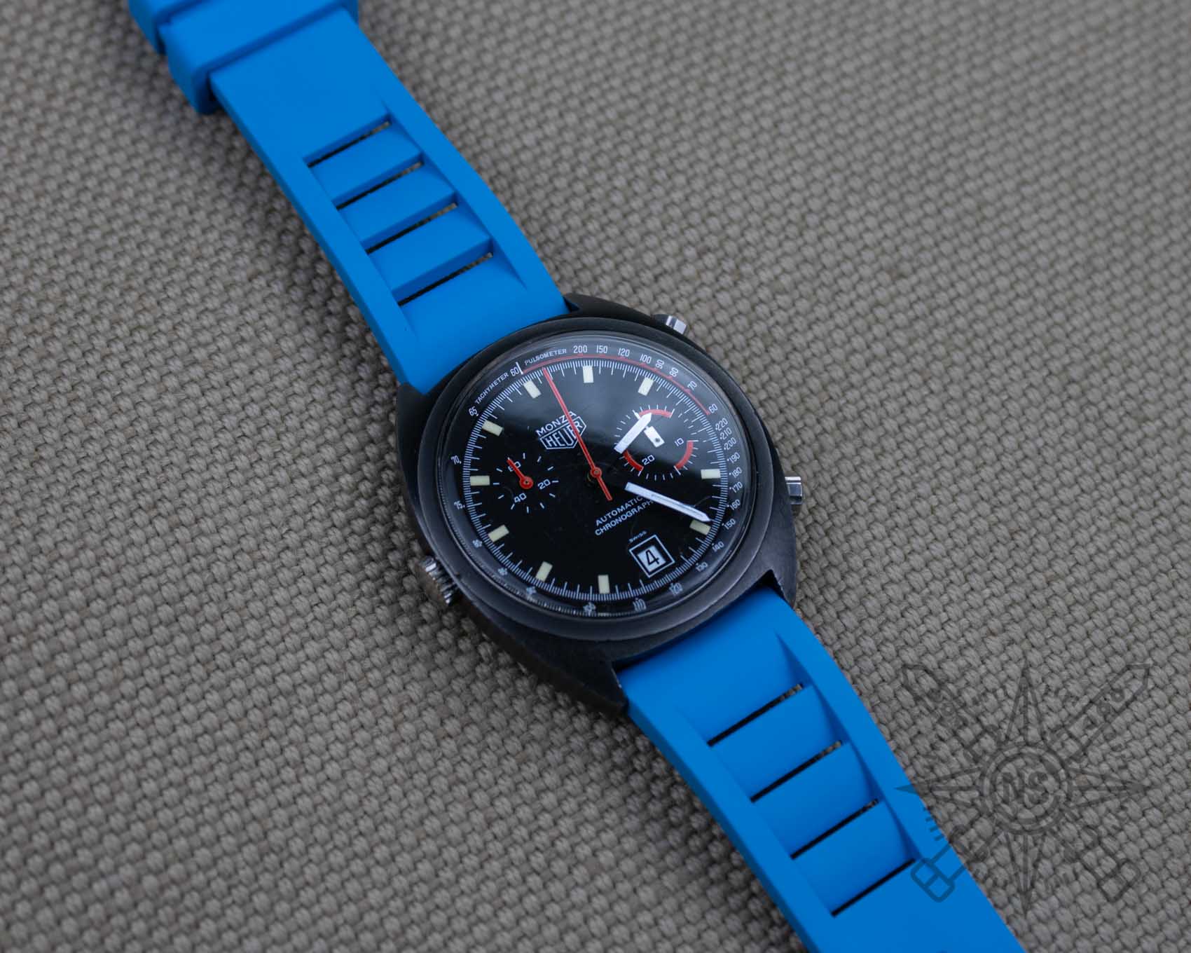 Blue rubber watch strap on a vintage Heuer Monza