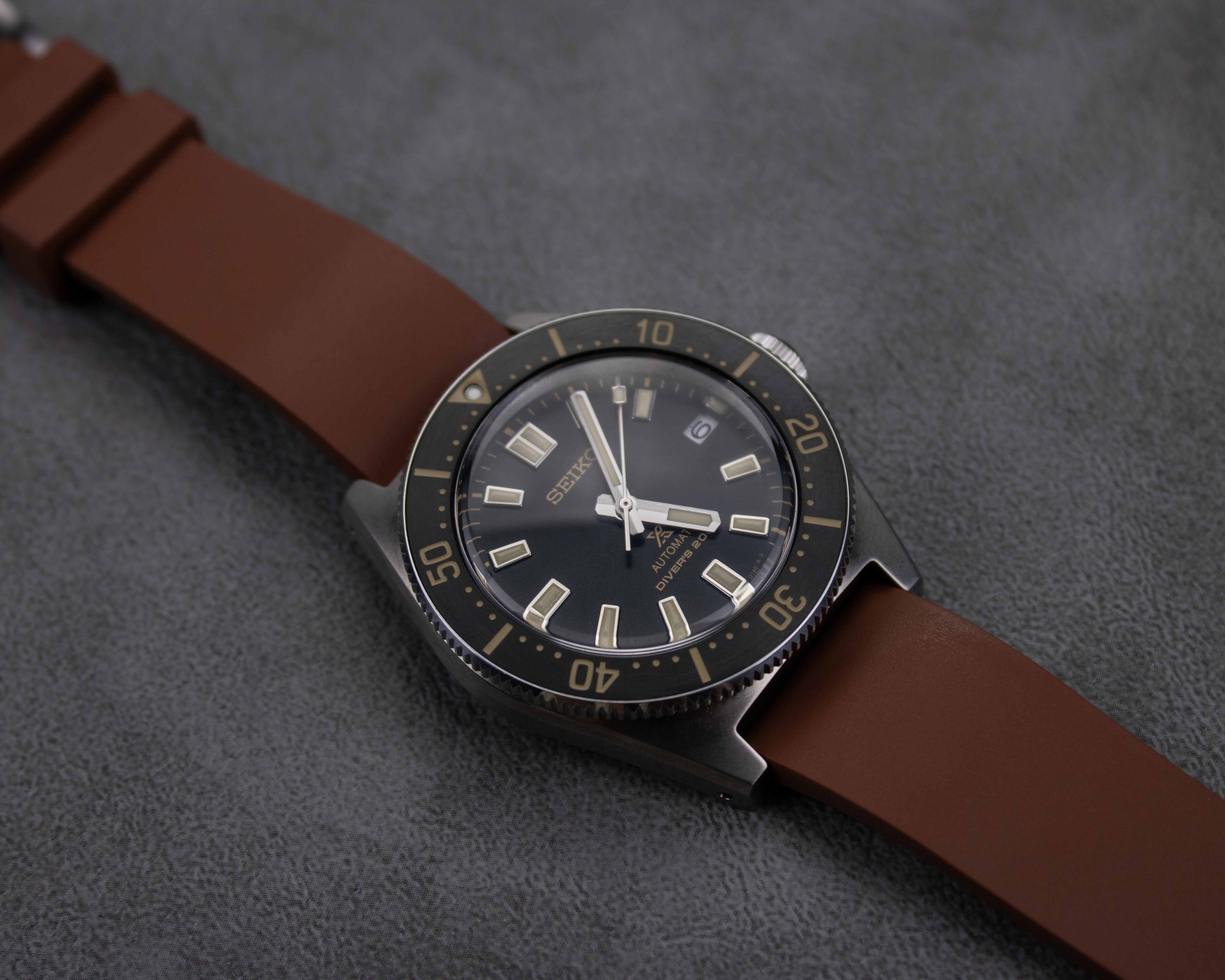 Brown rubber watch strap on a Seiko dive watch