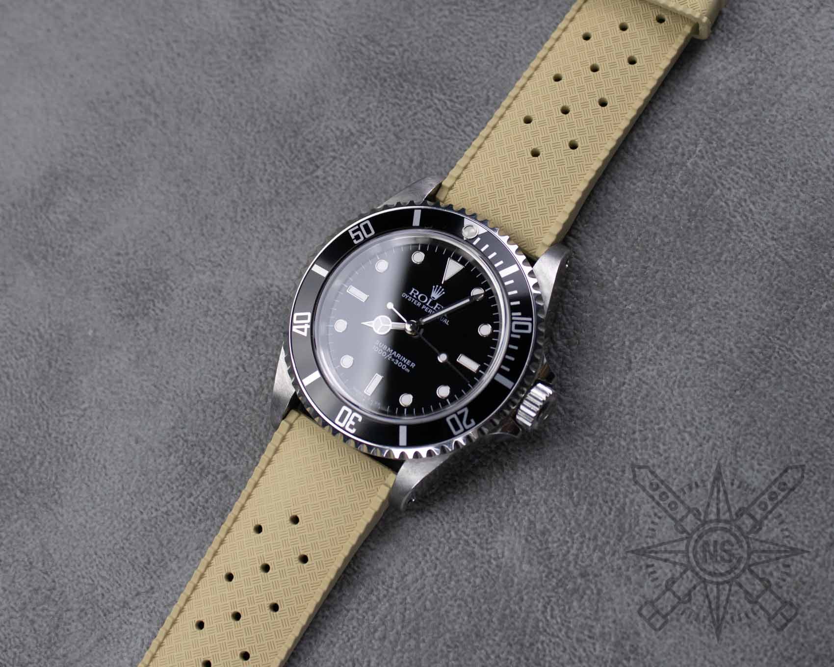 Sand beige vintage tropic rubber watch strap on a Rolex Submariner